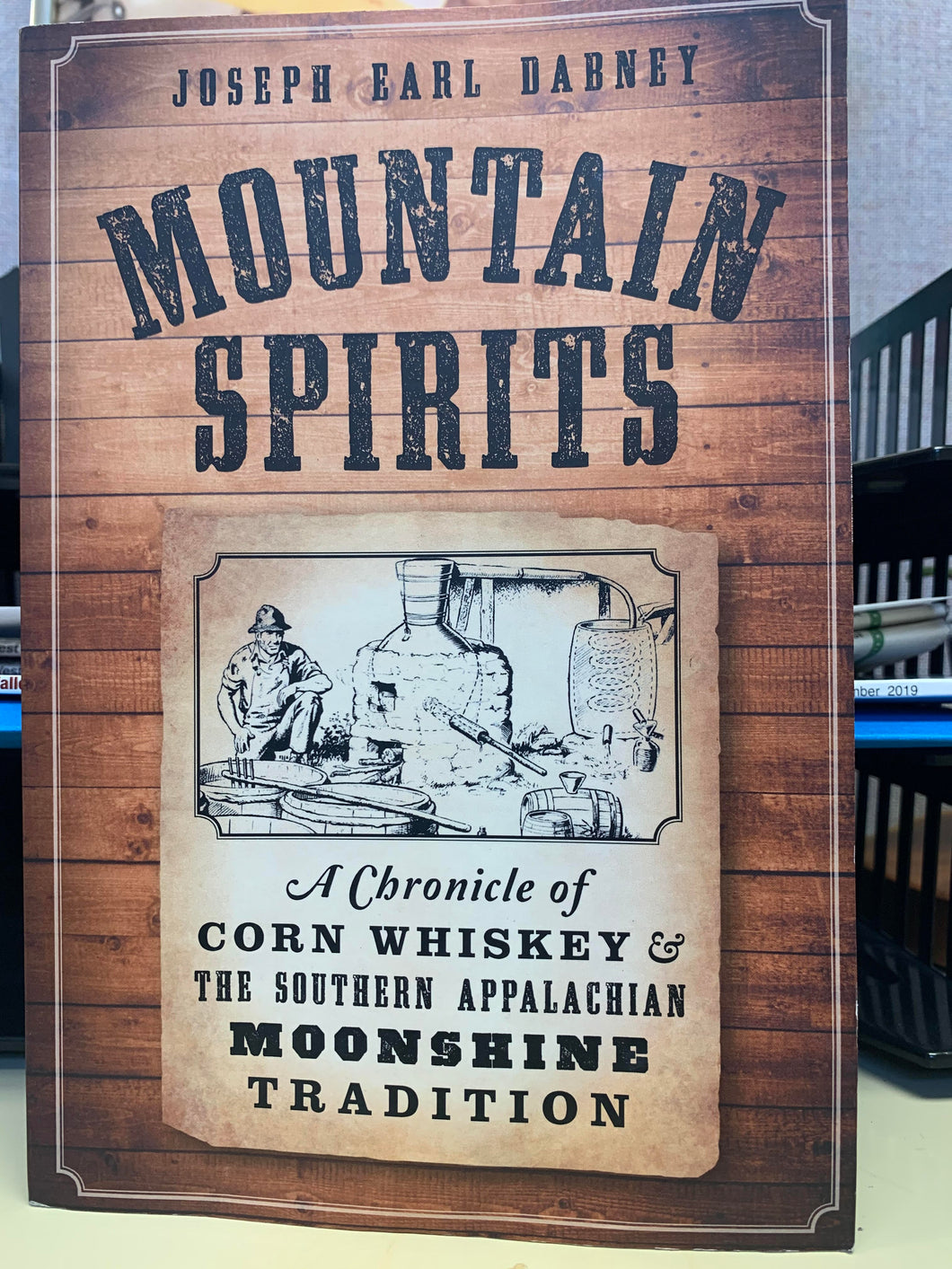 Mountain Spirits: A Chronicle of Corn Whiskey & The Southern Appalachian Moonshine Tradition by Joseph Earl Dabney